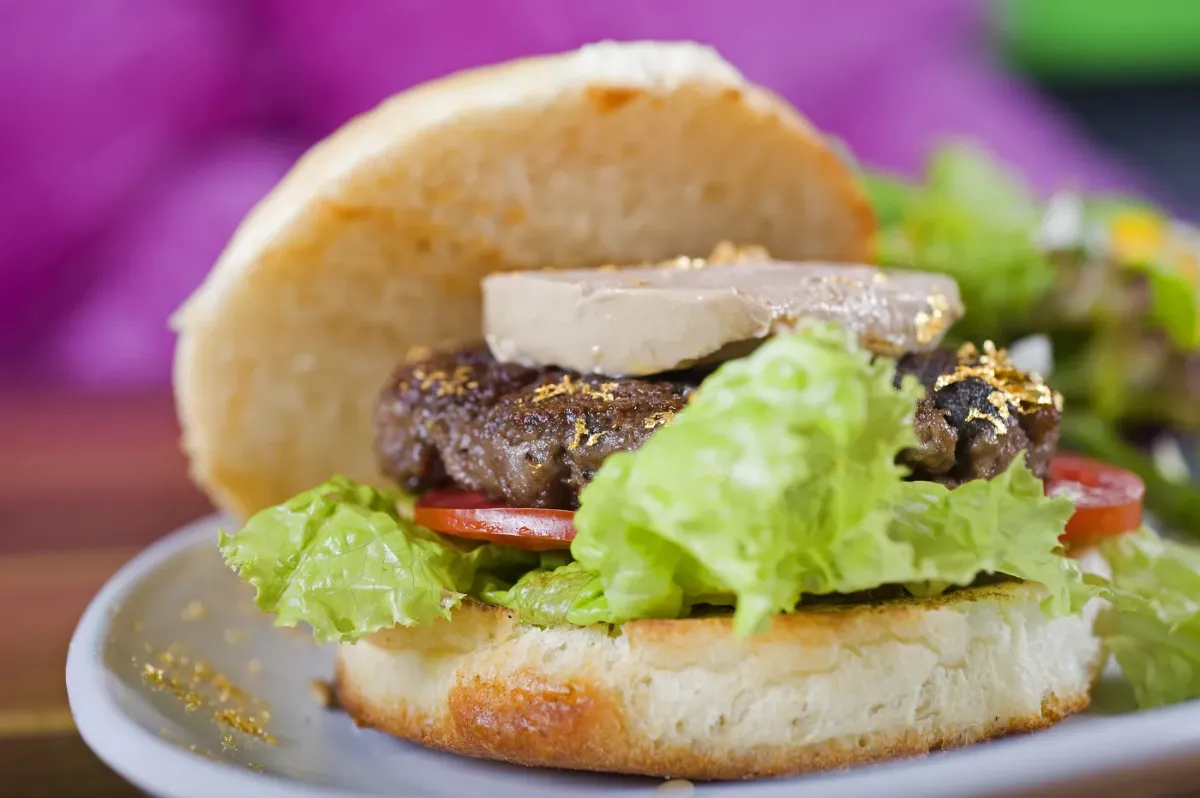 Burger with foie gras and gold flitter topping